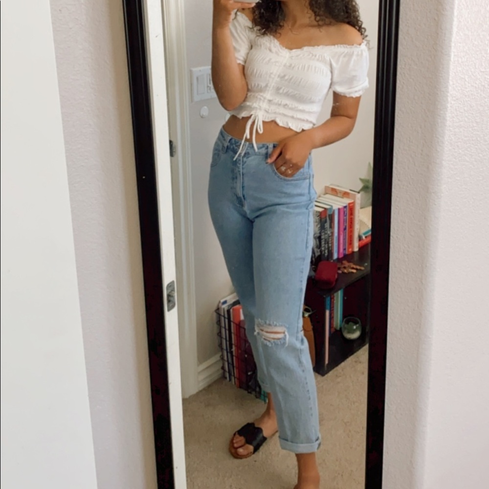 Cotton on light wash straight leg jeans with whole in one knee